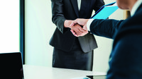 Job applicant having interview. Handshake while job interviewing